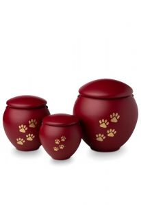 Urne-animal rouge avec impression de pattes or